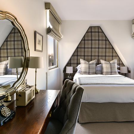 邓斯坦之家酒店 爱丁堡 外观 照片 A bedroom at the hotel