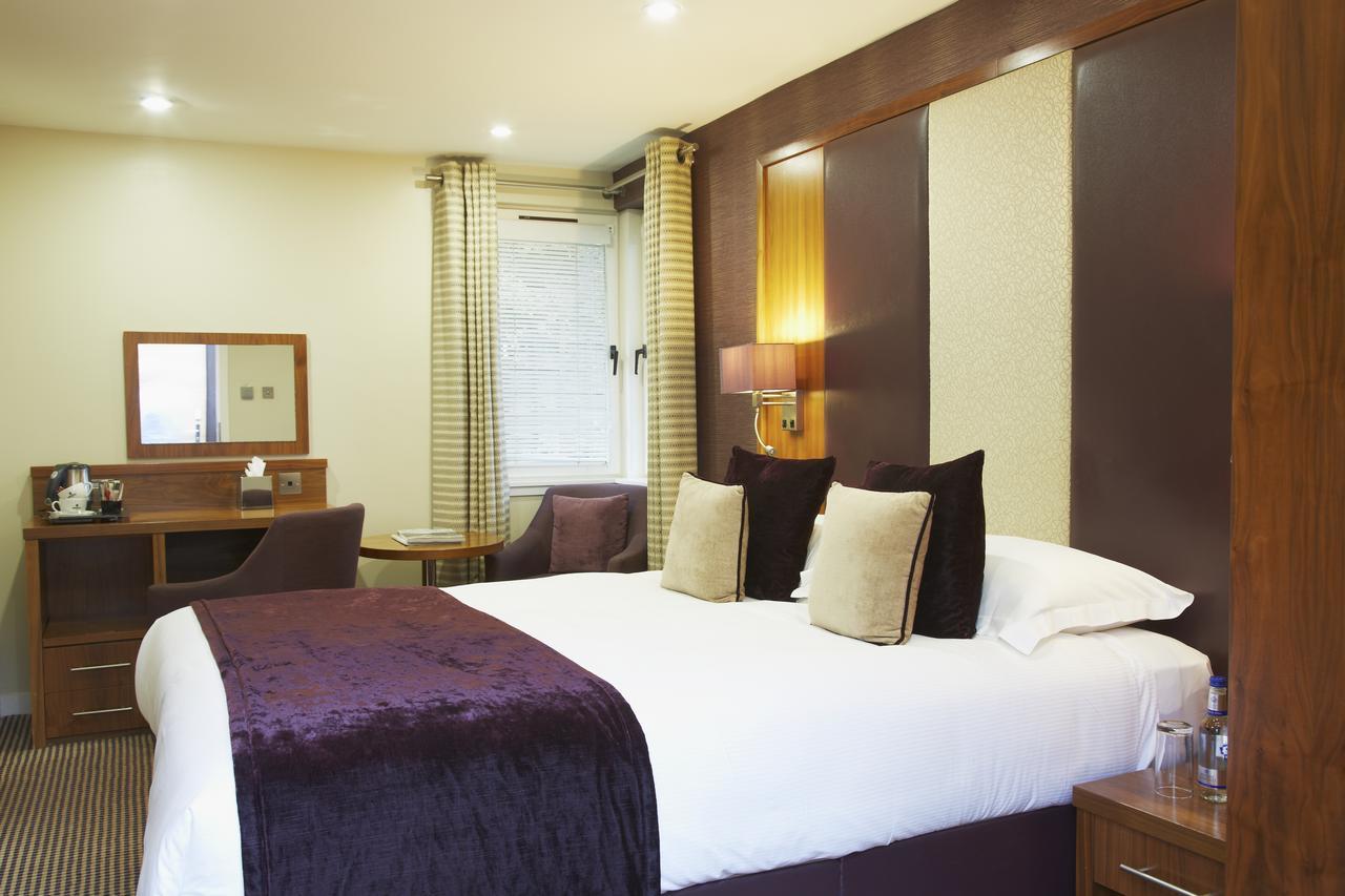 邓斯坦之家酒店 爱丁堡 外观 照片 A bedroom at the hotel