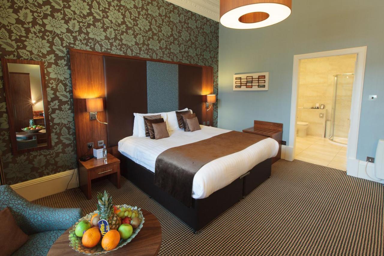 邓斯坦之家酒店 爱丁堡 外观 照片 A bedroom at the hotel