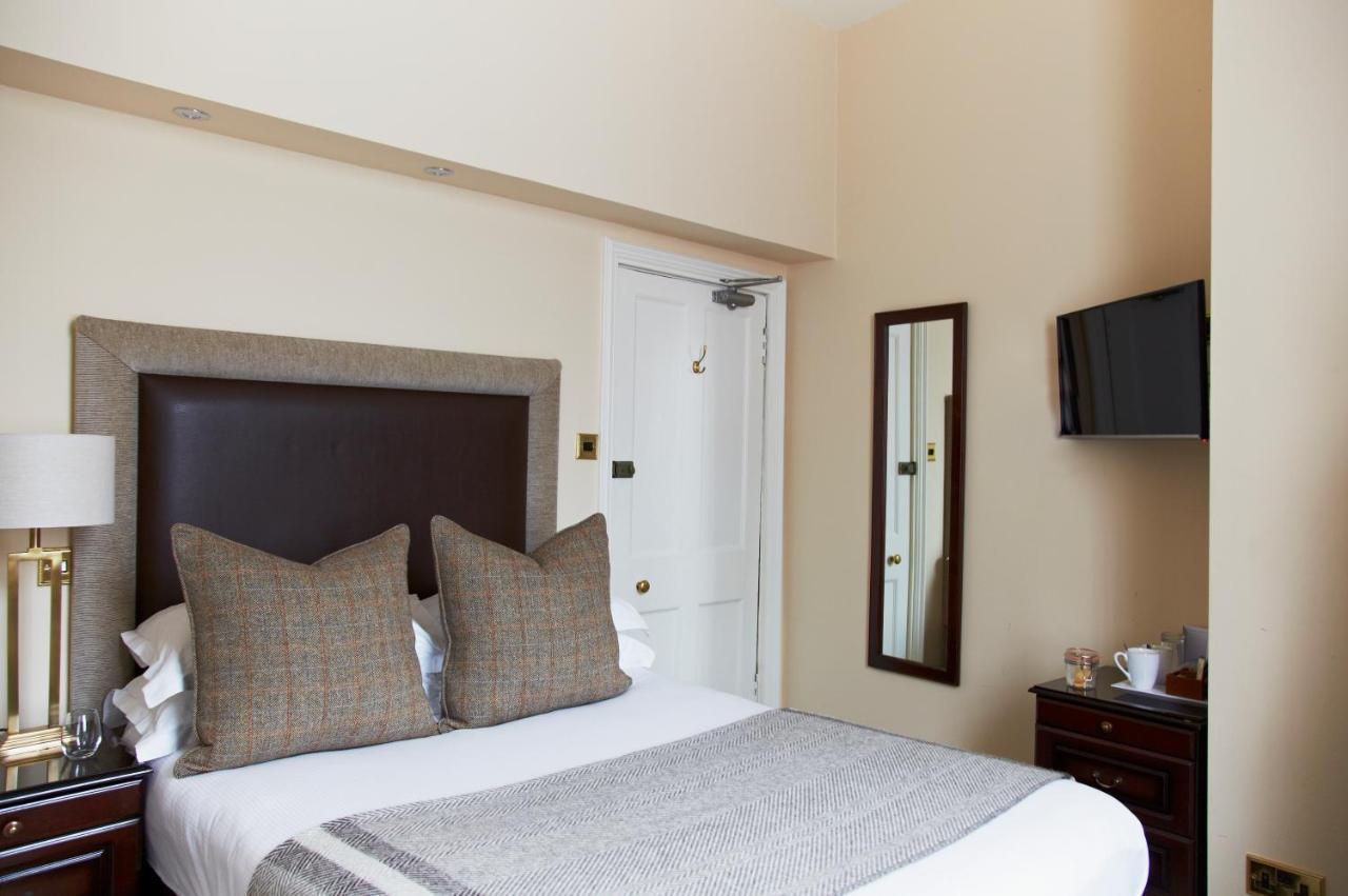 邓斯坦之家酒店 爱丁堡 外观 照片 A bedroom at the hotel